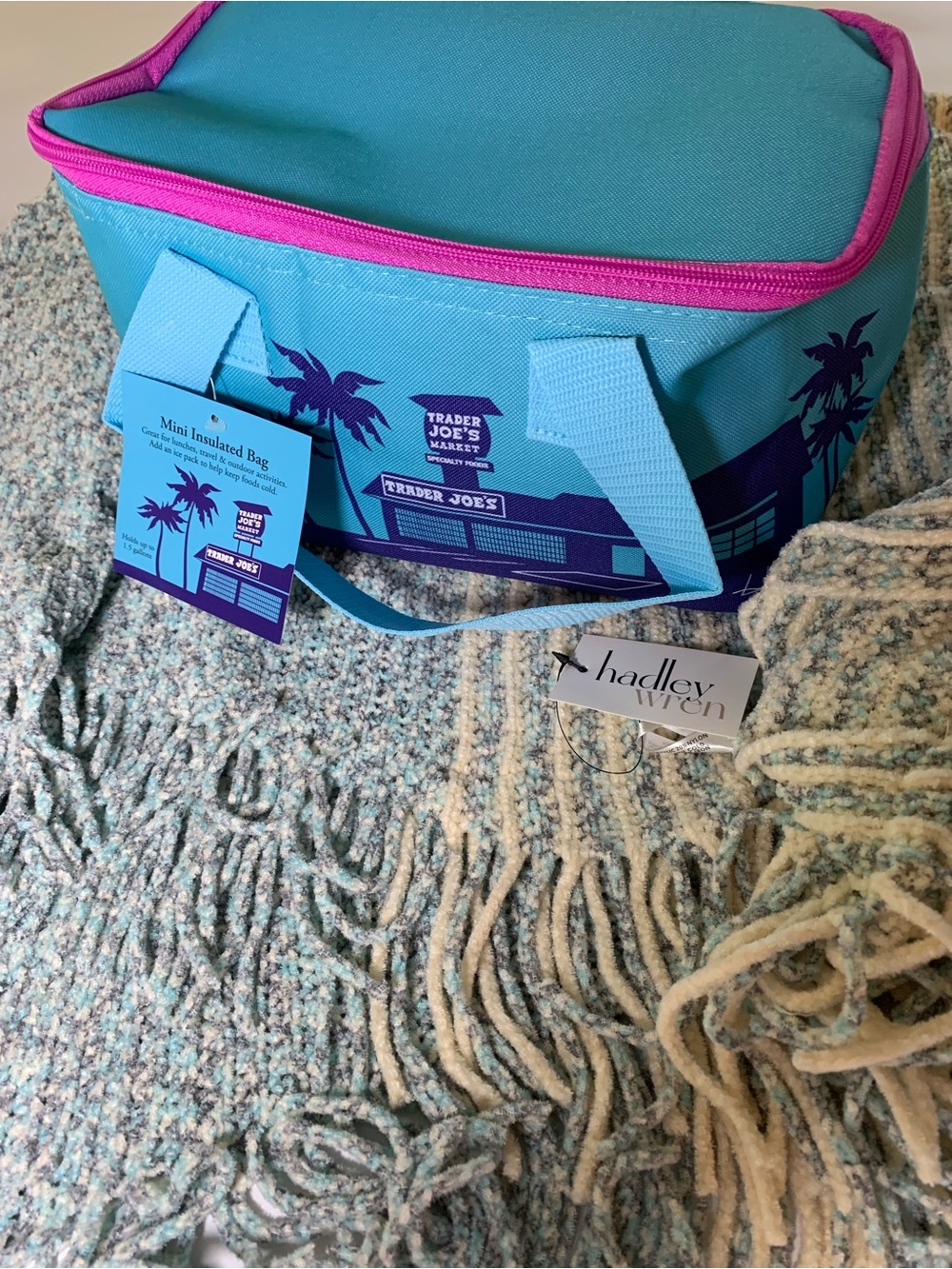 Hadley Wren poncho w soft blues,and gray. Bundled with Trader Joe’s Mini Cooler